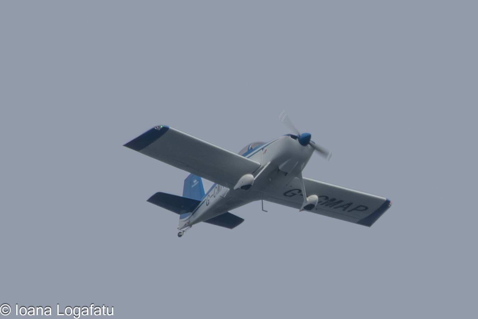 Soaring high above the clouds in blue skies